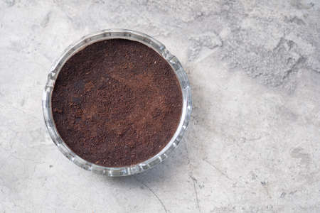 Ashtray placed on a wooden table. Easy dirty ashtrayの写真素材