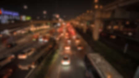 Blurred of car brake light on traffic jam road night. Traffic jam in city concept