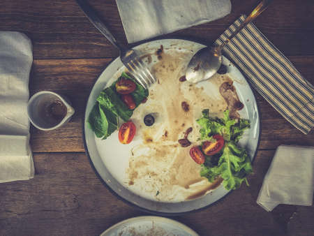 After eating healthy food together in the restaurant. Concept of group of people dining. Enjoy eating.の写真素材