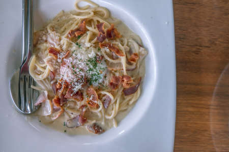 Spaghetti Carbonara with Bacon and Ham in mayonnaise cream sauce for food and drink category