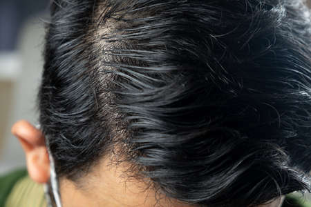 Close up photo of man vintage hair style. Hairstyle for a young man.の写真素材