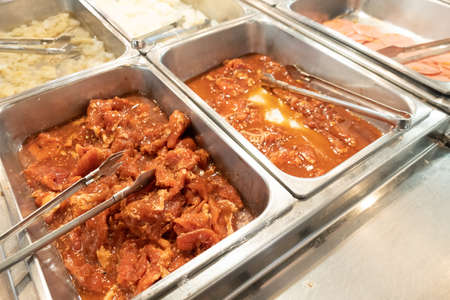 Various of raw food for grill or boiled at self service at Thai style BBQ buffet. It called Moo-Ka-Ta.の写真素材