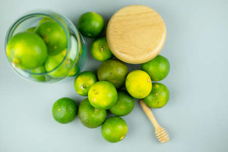Close up of the green lime. Lime is a kind of fruit. The result is very sour for cook the Thai food styleの写真素材
