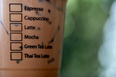Iced coffee cup with design for ticking coffee menu at the cup side