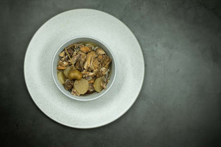 Boiled of chicken rib soup with radish in bowlの写真素材