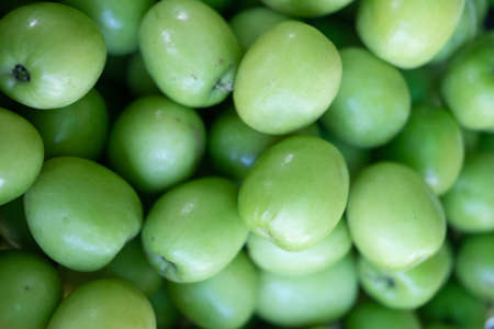 Ziziphus mauritiana, also known as Jujube, is a tropical fruit in Asia.