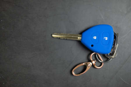 Blue car remote key cover silicone on black backgroundの写真素材