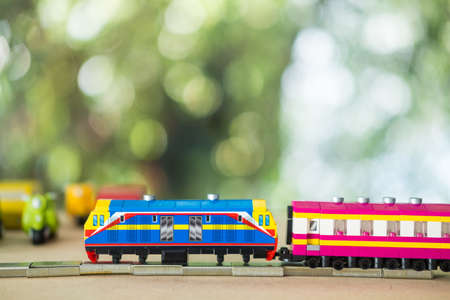 Thai miniature old diesel train. Train connect the city to countryside in Thailand in the long timeの写真素材