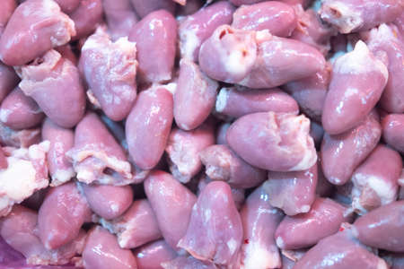 Raw food fresh chicken heart as background