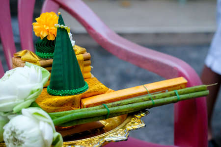 Flower decorated on tray with pedestal to be used in the ceremony to get ordained as a Buddhist monkhoodの写真素材