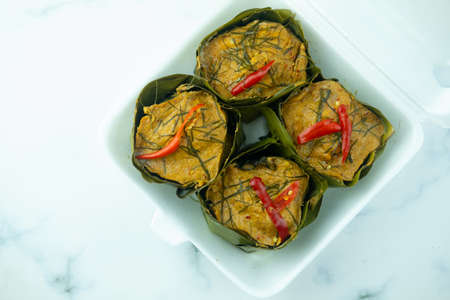Thai steamed curried fish (Hor Mok Pla) in foam box. Thai traditional food styleの写真素材