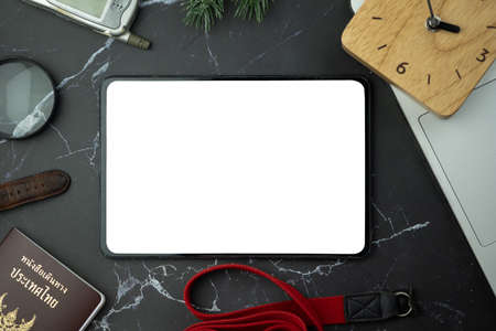 Office desk workspace and table background from top view above flat lay objects. Empty tablet and...