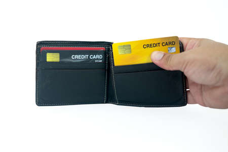 Man holding and took the credit card out of pocket on a white background. Clipping path