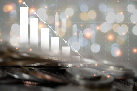 Double exposure image of coin stacks on technology financial graph background. business idea and all art work design. Abstract finance background.の写真素材