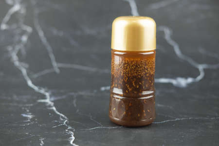 Japanese soy sauce sesame salad dressing in plastic bottleの写真素材