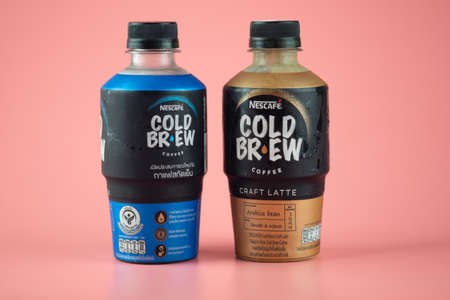 Samut Prakan, Thailand - April 26 2020 : Nescafe launches of cold brew coffee in plastic bottle on a pink backgroundのeditorial素材