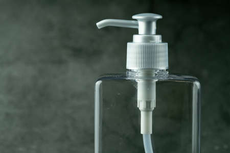 Transparent pump bottle on black backgroundの写真素材