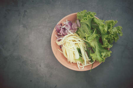 Side dish for crispy catfish spicy salad on  pink dishの写真素材