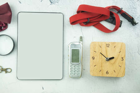 Mix of office supplies and gadgets on desk background. View from above.の写真素材