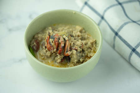 Top view of delicious Tao Jiaw Lone (Herbed soya beans with minced pork and crab in coconut milk. Traditional Thai food.の写真素材