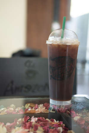 Bangkok,Thailand - 30 April 2020: iced Americano coffee of amazon brand on a table at Amazon.  It's...