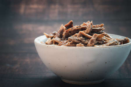 Small fried crispy fish sweet is the food and snack in Thailand in bowlの写真素材