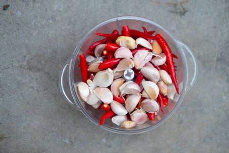 Hot red pepper and garlic in a blender prepare for cooking Thailand foodの写真素材