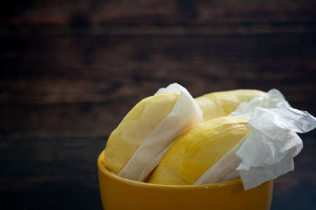 Fresh of durian on yellow bowl. Durian king of fruit from Thailand, close upの写真素材