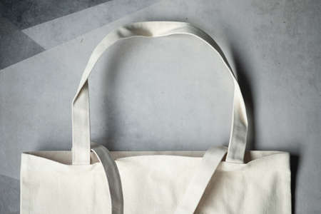 Blank Eco shopping bag made of fabric or tote bag fabric cloth shopping sack. Concept of ecology or...