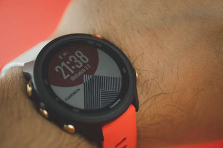 Samut Prakan, Thailand - June 18, 2020 : The exclusive watch from branded Garmin face for the Toward Tokyo Limited Edition Foreunner 245 Music takes sacred Mount Fuji as its theme, perfectly complementing the design of the watch casing.のeditorial素材