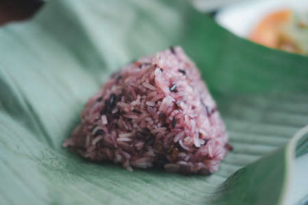 Black sticky rice on banana leaf. Close upの写真素材