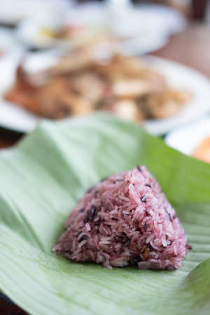 Black sticky rice on banana leaf. Close upの写真素材