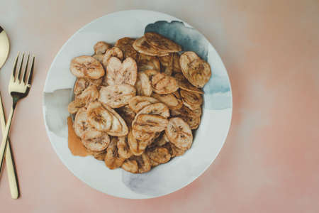 Homemade banana chips baked with honey. Dried food snack Thai styleの写真素材
