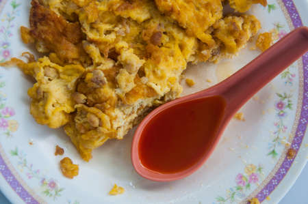 Thai style Omelet with dip sauce. Delicious easy cook conceptの写真素材