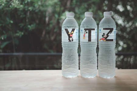 Bangkok, Thailand - August 2, 2020 : Plastic bottle drink water "Singha Water" new collection "Mickey Mouse Collection" concept of CREATE YOUR OWN HAPPINESS. The brand is SINGHA, one of most famous beverage brand in Thailand.のeditorial素材