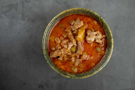 Delicious Thai pork panang curry. Thailand tradition red curry with pork or chicken menu in Thai name is panaeng.の写真素材