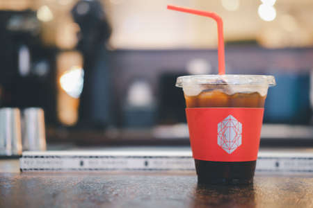 Samut Prakan, Thailand - August 6, 2020 : A glass of iced black Americano of 'RED DIAMOND' The famous and specialty coffee shop at Mega Bangna shopping mall in Thailandのeditorial素材