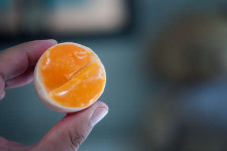 Preserved double eggs yolk in egg shell Thai called Kai Krob. Local knowledge for preserved food in...
