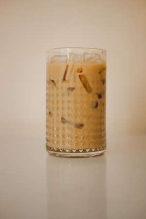 Close up of iced coffee in glass on table