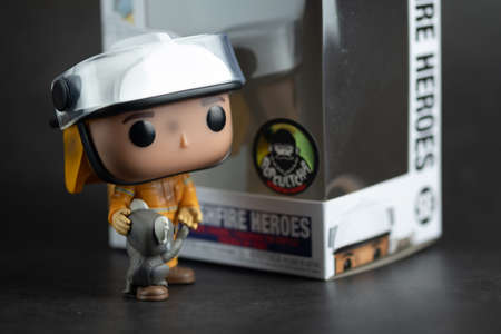 Bangkok, Thailand - August 18, 2020 : Toy for charity. Australia is fire an environmental. Firefighter fight blaze and protect Koala with Kangaroo as hero. Funko Pop figure exclusive Bushfire Heroes Fのeditorial素材