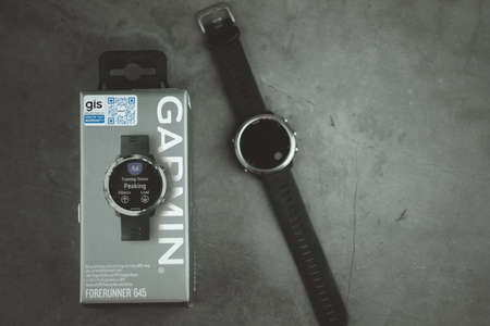 Bangkok, Thailand - August 21, 2020 : Smart watch brand of Garmin Forerunner 645 on black background