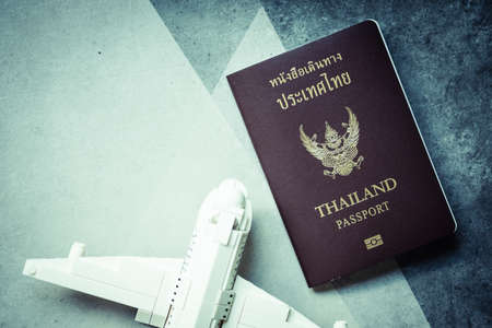 Thailand passport of Thai citizen and model plan. The concept of prepared for the tripの写真素材