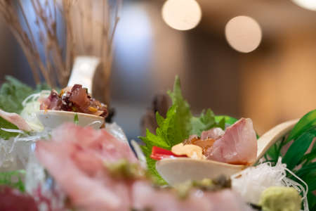 A set of Omakase fish sashimi premium set serve on ice. Japanese food styleの写真素材