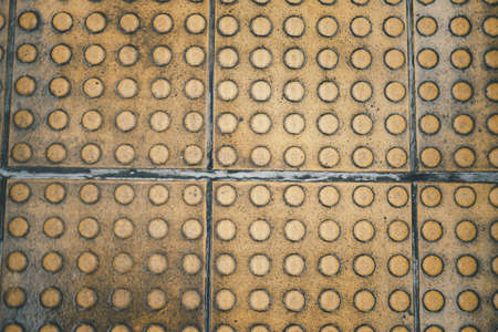 Yellow dot walk way, blind safety on pavement and footpaths pathway. Top view