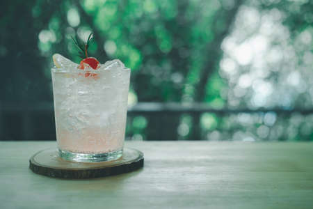 Lychee fizzy drink mix with soda on wood tableの写真素材