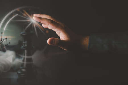 Businessman touch black king chess with digital graphic goal lock business ideas concept. Double exposure graphic iconの写真素材