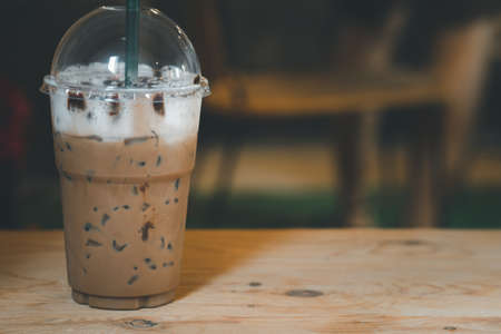 Delicious iced mocha coffee in plastic glass. another summer drink menuの写真素材