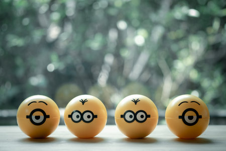 Samut Prakan, Thailand - June 28, 2020 : Yellow plastic capsule of Minions toy from McDonalds Happy Meal. Random toy in capsuleのeditorial素材