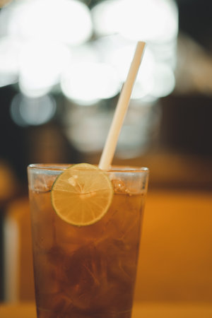 Glass of ice tea with lemon slice. Selective focusの写真素材