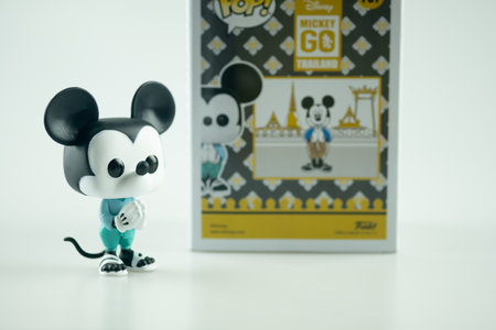Samut Prakan, Thailand - January 14, 2021 : Funko Pop Mickey Mouse is wearing Thailand's national costume dress. For the first time ever, the iconic world's character Mickey Mouse has been designed with a new outfit and signature pose.のeditorial素材